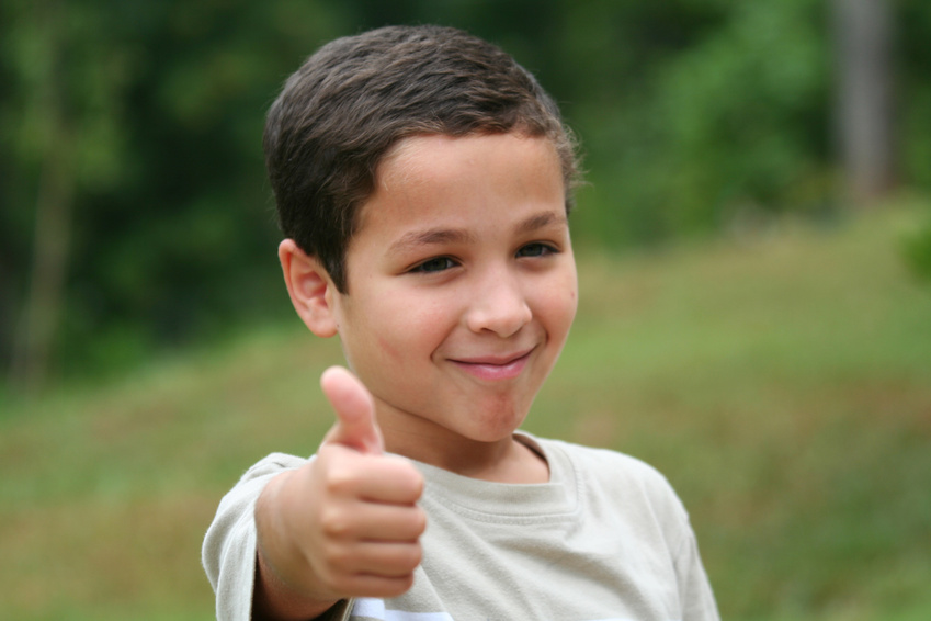 Young boy encouraging