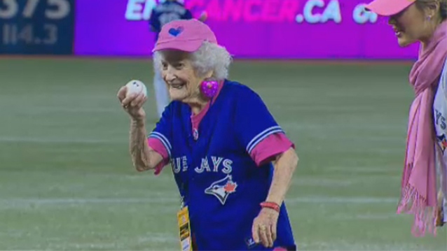 Kitty Cohen throws first pitch