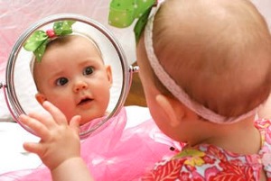 baby in mirror