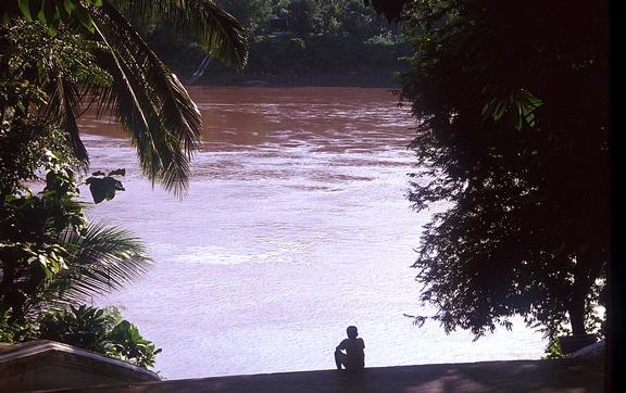 sitting on river bank