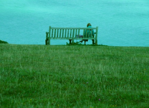girl sitting on bench