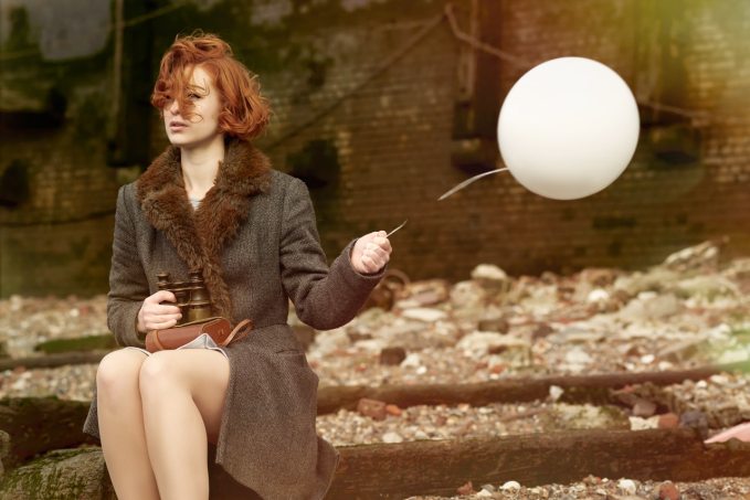woman-holding-white-balloon-3064615